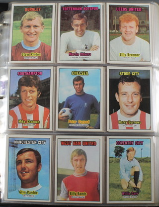 An album of various ABC large trade cards, Footballers first series (orange) 1970, Footballers second series (orange) 1970, Footballers third series (orange) 1970, Footballers Scottish second series (green) 1970, Footballers Scottish first series (purple) 1971, Footballers second series (purple) 1971, Footballers third series (purple) 1971