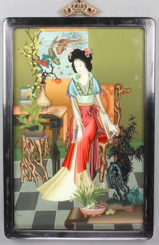 A 20th Century Chinese reverse painting on glass of a seated lady in a pavilion, 18 1/2" x 12"
