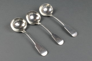 A Victorian silver fiddle  pattern ladle London 1884 and a pair of George III ditto 194gr