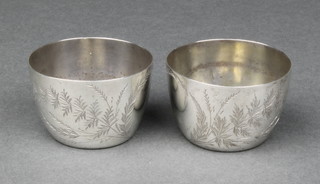 A pair of Victorian silver circular table salts London 1887 60gr