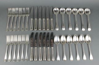 A set of silver cutlery with beaded decoration comprising 6 soup and 6 dessert spoons, 6 dinner and 6 dessert forks, 6 dinner and 6 dessert knives. Mixed dates Sheffield 1876, Birmingham 1903 and Chester 1903, 1600gr