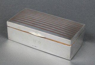 A rectangular silver cigarette box Birmingham 1926 7"