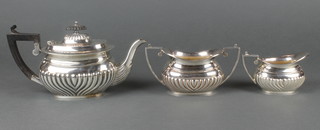 A silver plated demi fluted 3 piece breakfast tea set