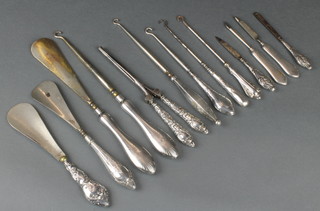 Three silver handled shoe horns, minor silver handled accessories and a gilt coloured bracelet 