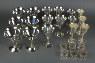 Seventeen silver plated goblets and 6 napkin rings