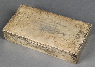 A silver rectangular cigarette box London 1963 7"