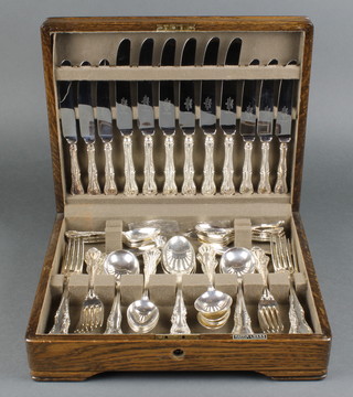 A 62 piece Mappin & Webb plated canteen of cutlery in an oak case