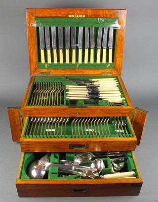 An Edwardian 109 piece silver plated canteen of cutlery for 12 in a fitted oak case