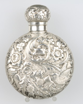 A Victorian silver repousse scent decorated with birds amongst flowers, Birmingham 1896, complete with stopper 2.5" 