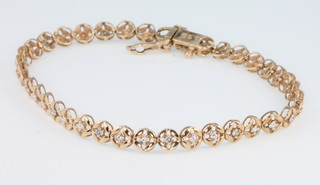 A 9ct yellow gold diamond set bracelet 5 grams