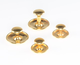 A set of 4 9ct yellow gold dress studs, 3 grams  in a fitted case and 2 fillings 