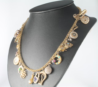A Victorian fancy link gold necklace with 25 gold and gilt, gem and hardstone charms