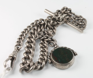 A silver watch chain and seal 