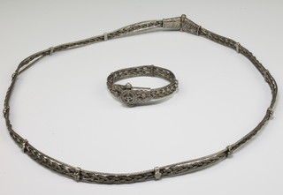 A Persian white metal necklace and bracelet 