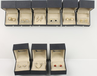 A collection of costume jewellery earrings