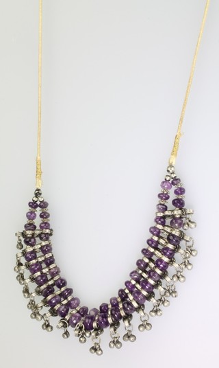 A white metal and amethyst Indian necklace 