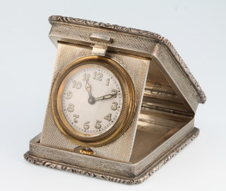An Art Deco engine turned silver folding bedroom timepiece, Birmingham 1930 