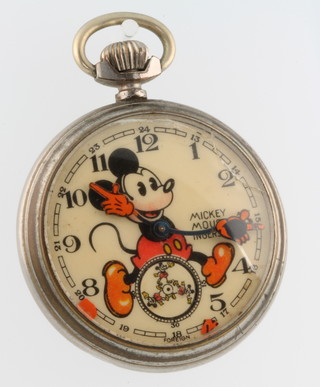 An Ingersoll Mickey Mouse pocket watch, the dial with image of Mickey with moving hands and with subsidiary moving dial beneath, the back with impressed Mickey Mouse and "Ingersoll Mickey Mouse", contained in a base metal case 5.25cms diam