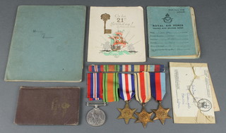 Group 1939-45, Africa, France and Germany Stars, Defence and War medals with issue paper, RAF service and release book, Red Cross ID card 1945 RAF Diary (with entries) 21st birthday card and notebook to 1531049 Cpl. A.McIvor 