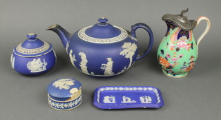 A Wedgwood blue Jasper tea pot 8", two lidded boxes, a tray and a Victorian jug