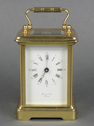 A carriage clock with enamelled dial and Roman numerals, the dial marked Bornand Freres of Bicester 