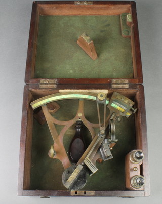 Thomas Ainsley, a 19th Century brass sextant, 2 eye pieces, marked Thomas Ainsley South Shields and Cardiff, contained in a mahogany box labelled Newport Observatory Nugent, Wells & Sons 