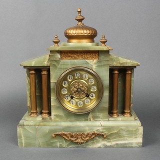 A Victorian French 8 day striking mantel clock with gilt dial and Arabic numerals contained in an onyx gilt mounted case, the dial marked John Elkan