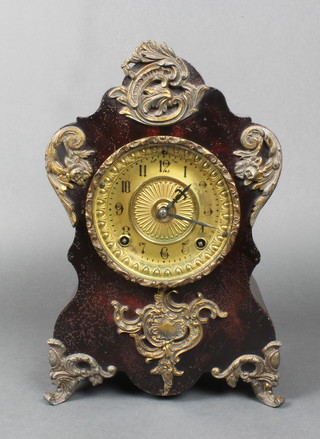 An Ansonia American striking mantel clock with gilt metal dial contained in a shaped metal case with gilt metal embellishments 