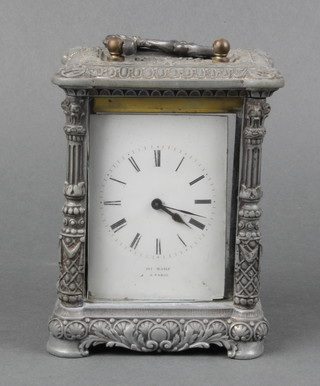 A 19th Century French carriage timepiece with rectangular dial marked H Y Marc a' Paris, contained in a cast metal case 