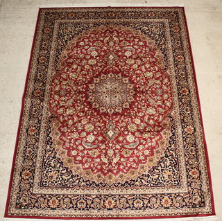 A contemporary red ground Belgian cotton Kashan style carpet 108" x 79" 