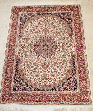 A contemporary Belgian cotton Kashan style white ground carpet with central medallion 76" x 55 1/2"  