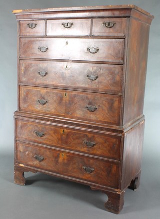 A Queen Anne walnut and crossbanded chest on chest, the upper section with moulded cornice, fitted 3 short drawers above 3 long drawers, the base fitted 2 long drawers, raised on bracket feet 61"h x 40 1/2"w x 23"d 