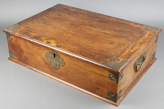 A Victorian Anglo Indian mahogany and brass banded writing box, the hinged lid revealing a fitted interior with various compartments 5 1/2"h x 20"w x 14"w  