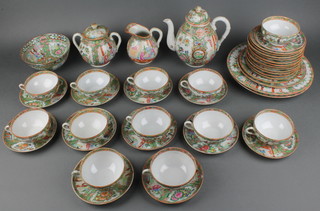 A quantity of various Canton famille rose teaware comprising 11" plate, 6" bowl and jug 5", a teapot, sucrier, 12 tea cups (3 cracked, 1 handle missing), 12 plates, 12 saucers 