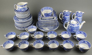 A quantity of George Jones Abbey pattern blue and white teaware comprising teapot, 2 hotwater jugs, 2 twin handled bread plates, 8 rectangular dishes, 2 small dishes, sugar bowl, cream jug (chipped), 5 tea plates, 7 side plates (2 cracked), 4 large saucers (2 chipped), 11 saucers (4 cracked), 13 tea cups (3 cracked) 