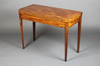 A Georgian mahogany D shaped card table with satinwood stringing and square tapered supports 26 1/2"h x 36"w x 18"d 