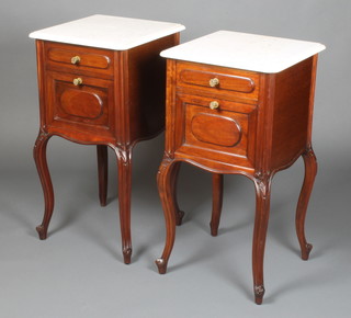 A pair of 19th Century French mahogany bedside cabinets with white veined marble tops, fitted a drawer with cupboard enclosed by a panelled door, on cabriole supports 32"h x 16"w x 16"d
