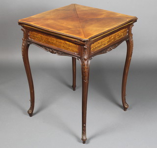 An Edwardian inlaid mahogany envelope card table, with crossbanded top and inlaid pen work, fitted a drawer and raised on carved cabriole supports 29"h x 24"w x 24"d 