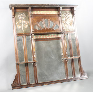 An Edwardian Art Nouveau multi-plate over mantel mirror contained in a mahogany frame and embossed copper panels 41" x 43"