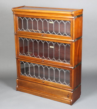 A Globe Wernicke mahogany 3 tier bookcase enclosed by glazed panelled doors 45"h x 34"w x 10"d 

