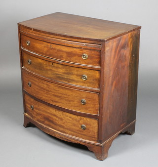 A 19th Century mahogany bow front chest with crossbanded top and brushing slide, fitted 4 long drawers raised on bracket feet 31"h x 28"w x 19"d 