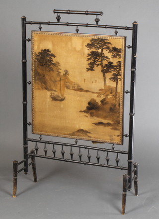 An Edwardian ebonised bamboo fire screen with machine made tapestry panel 42 1/2"h x 27"w
