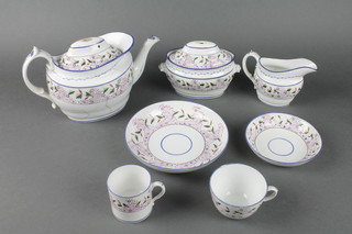 A 19th Century English teaset comprising teapot and stand, sucrier, cream jug, sugar bowl, 8 coffee cups, 2 tea cups, 7 saucers and a slop bowl 