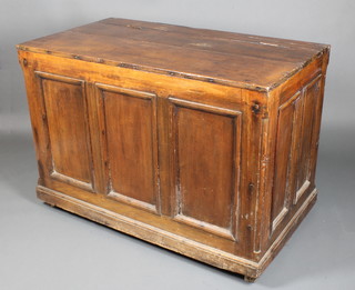 An 18th Century elm feed bin of panelled construction with hinged lid 36" x 52"w x 29"d 