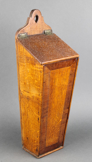 An 18th/19th Century elm candle box with crossbanded decoration to the front, 17"h x 5 1/2"w x 6 1/2"d 