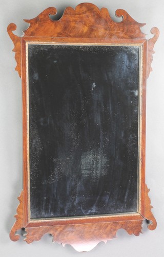 A Chippendale style rectangular plate wall mirror contained in a mahogany frame 26"h x 16"