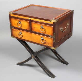 A campaign style mahogany chest with three-quarter gallery fitted a brushing slide above 2 short and 1 long drawers with X framed stretcher, having brass iron drop handles to the sides 26"h x  22 1/2"w x 16"d 