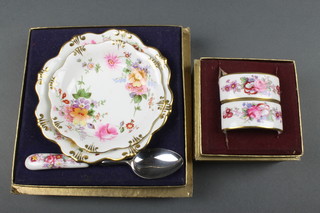 A cased Royal Crown Derby preserve dish and spoon, a ditto dish and pair of napkin rings 