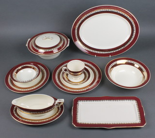 Myott, New Hampshire pattern tea and dinner service comprising 5 tea cups, 6 saucers, 6 side plates, 6 medium plates, 6 dinner plates, 1 meat plate, 6 dessert bowls, fruit bowl, rectangular tray, 2 tureens and covers and a sauce boat and stand 
