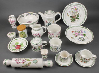 An extensive Portmeirion Botanic Garden pattern tea, coffee and dinner service comprising 8 coffee cans, 4 saucers, 5 tea cups, 9 saucers, 1 coffee pot, 1 milk jug, sugar bowl and lid, rolling pin, vase, tea bag dish, shallow bowl, egg cup, dish, 6 large saucers, 8 dessert bowls, 2 heart boxes, spice jar, cake stand, 2 jardinieres, 15 small plates, 13 medium plates, 9 dinner plates, fruit bowl, flan dish and 2 odd plates, together with a plastic tray and oven gloves 